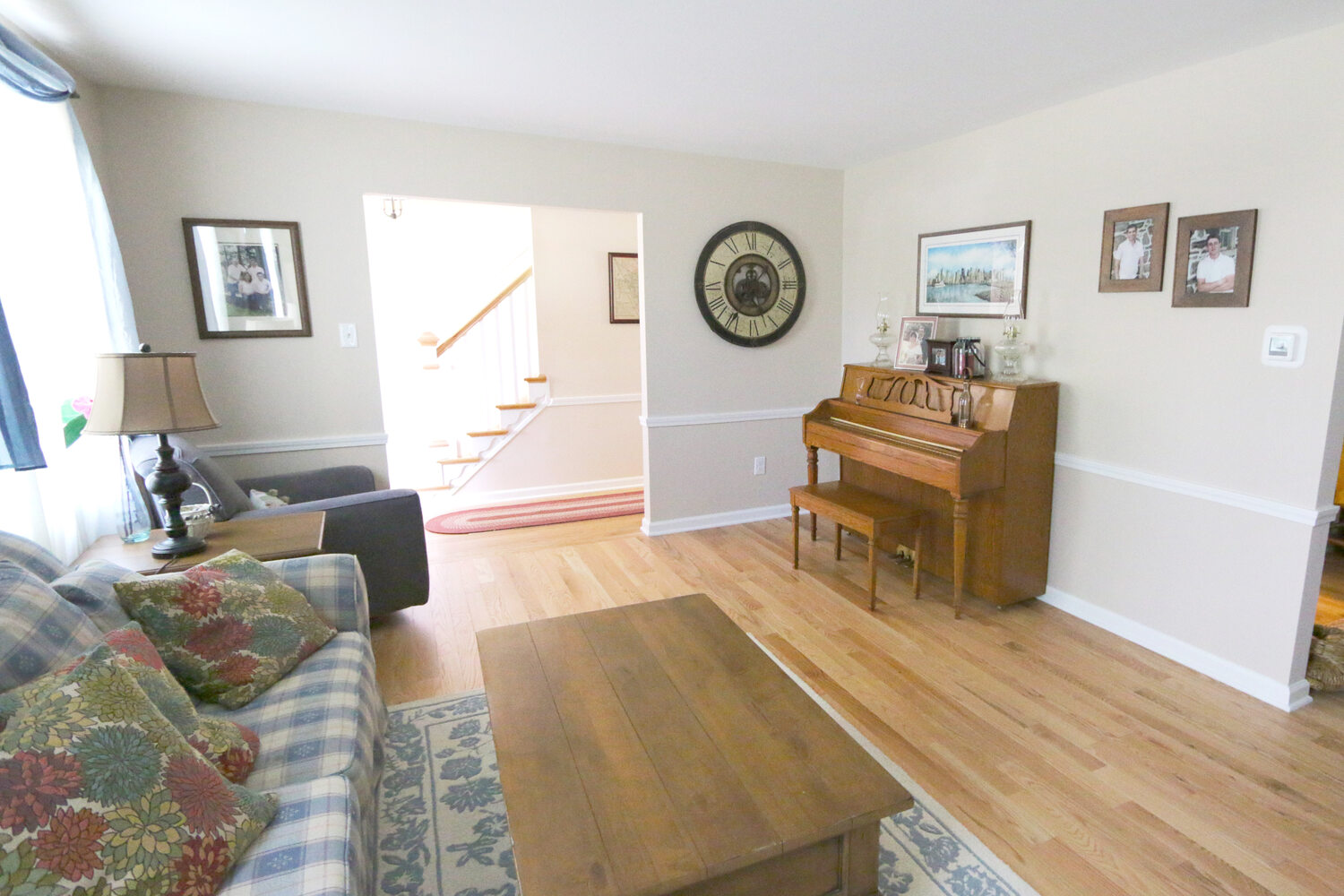 Restored living room interior with hardwood flooring in a custom Perkasie, PA home by Metzler Construction