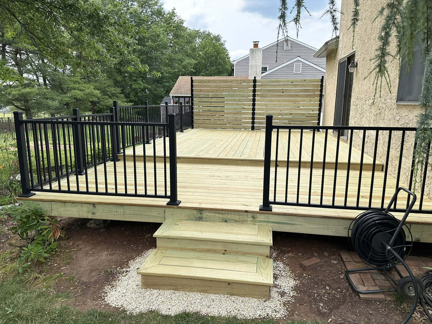 Wood deck with black railing in Montgomery County