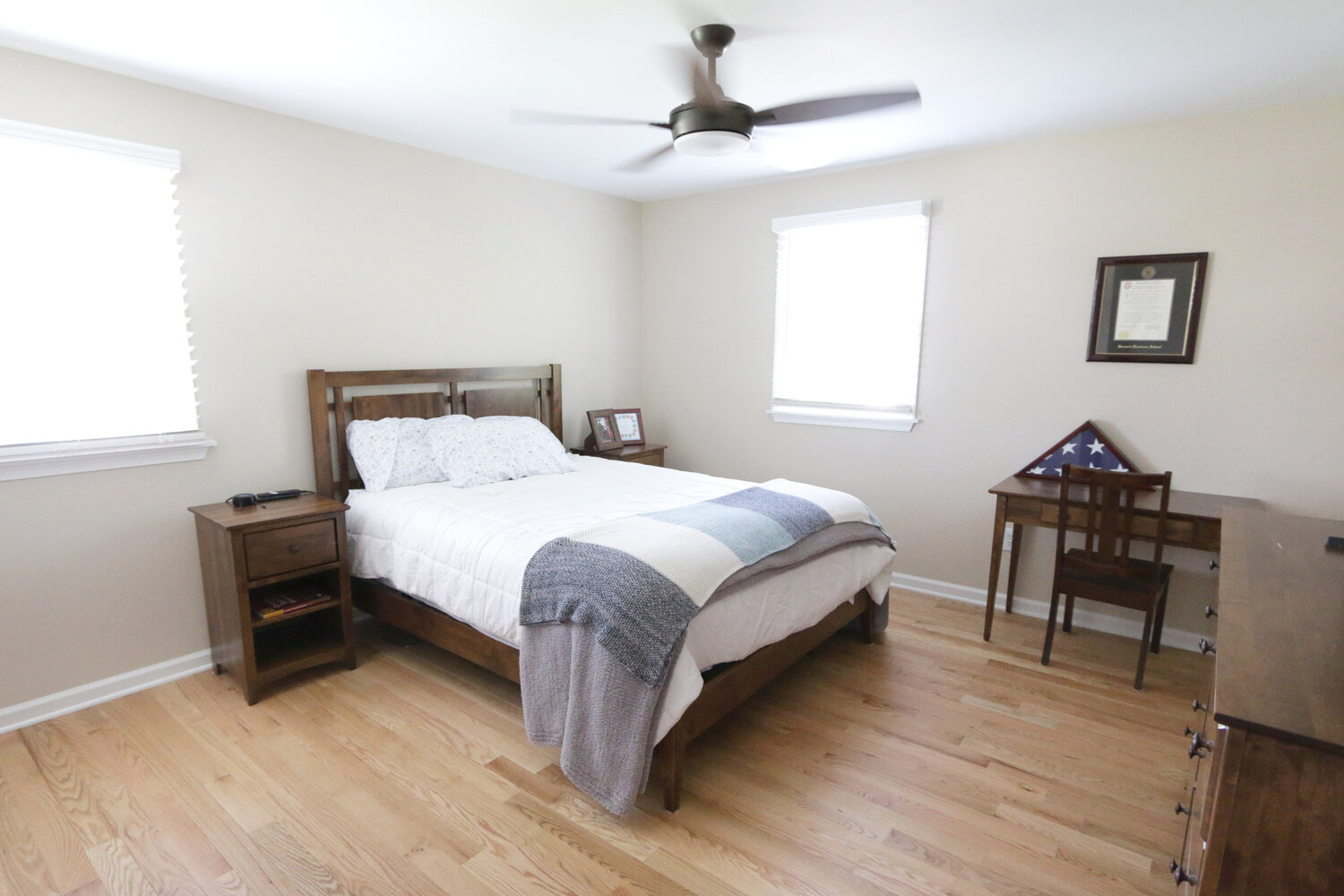 Fully restored master bedroom with new flooring and fresh paint in Perkasie, PA by Metzler Construction