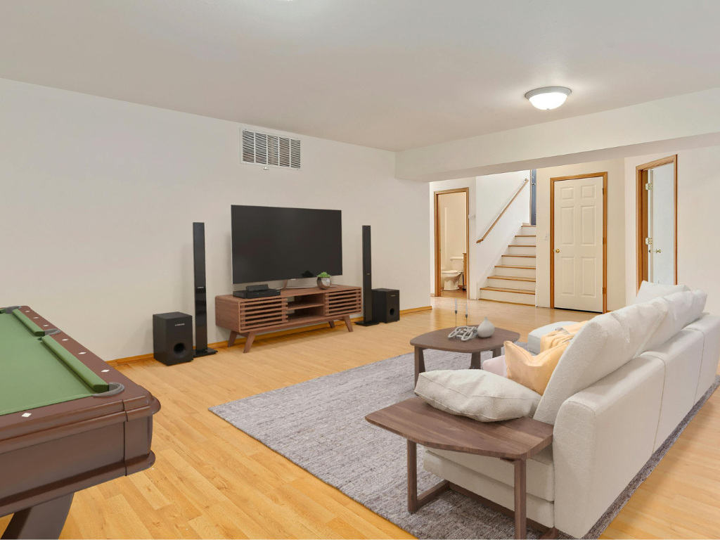 Custom Perkasie basement remodel with home theater and recreation space by Metzler Construction - Stock Image