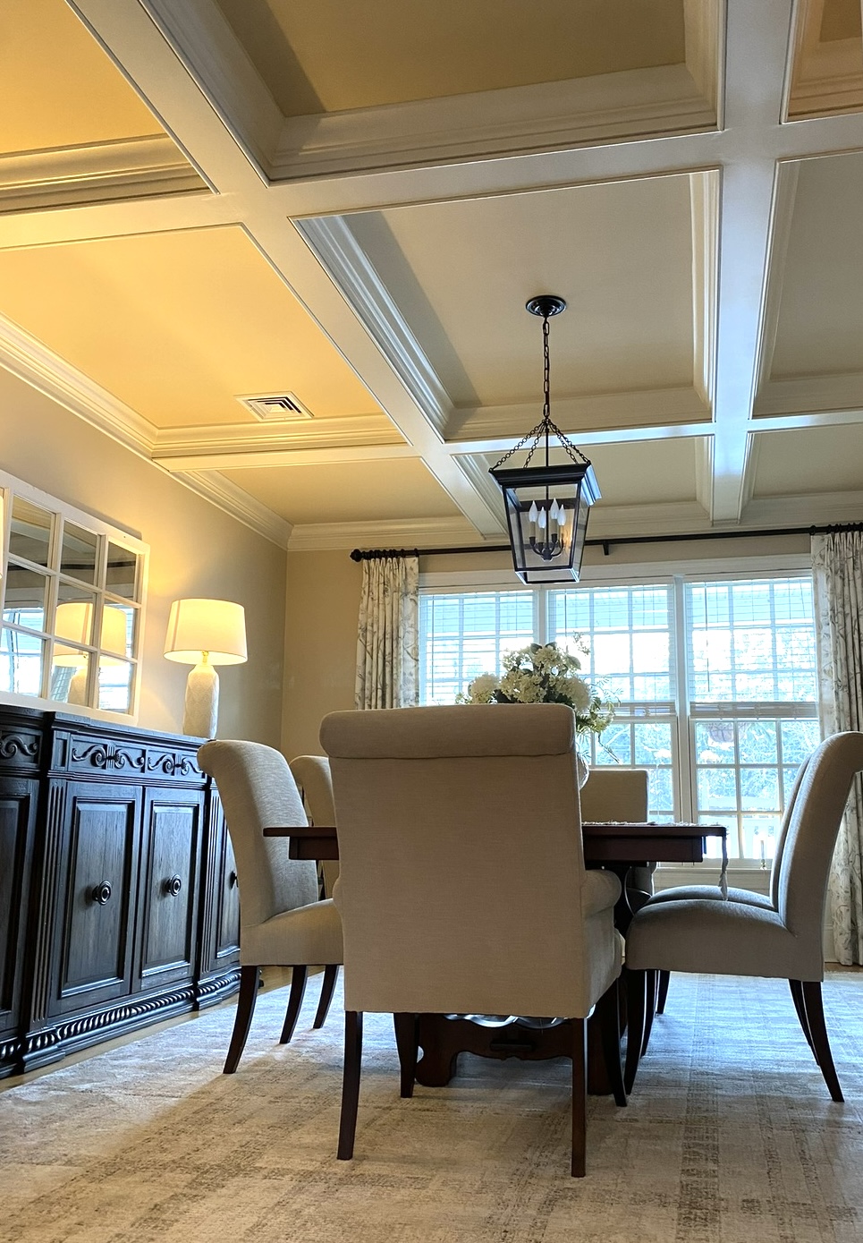 Custom crown moulding in dining room by Metzler Construction